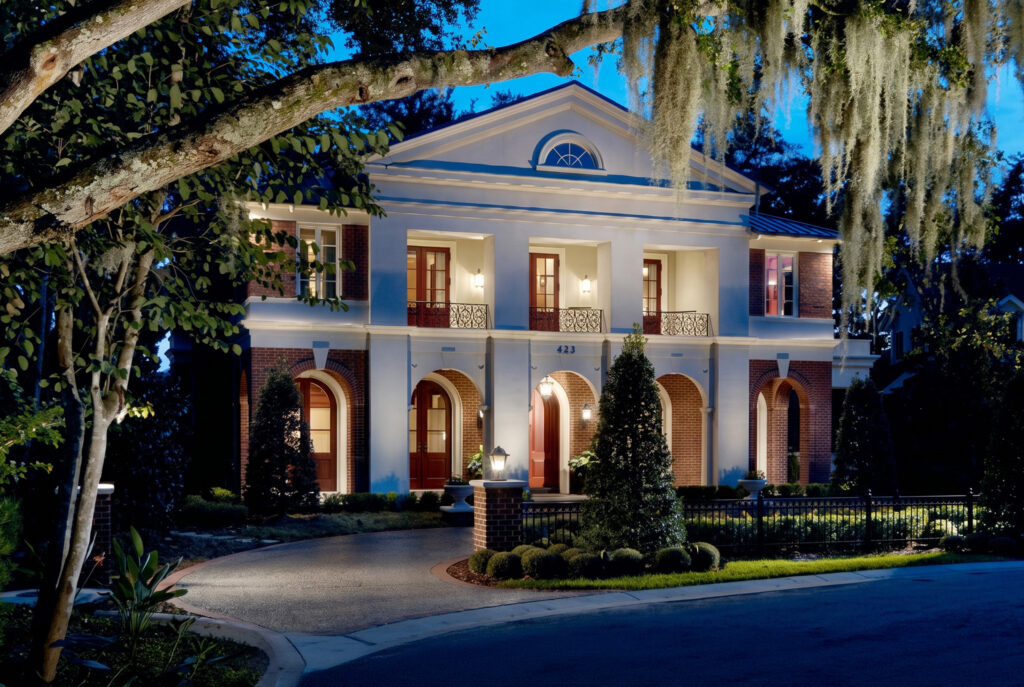 Front exterior of this beautiful Georgian Classical home, built by Posada Custom Homes in Central Florida