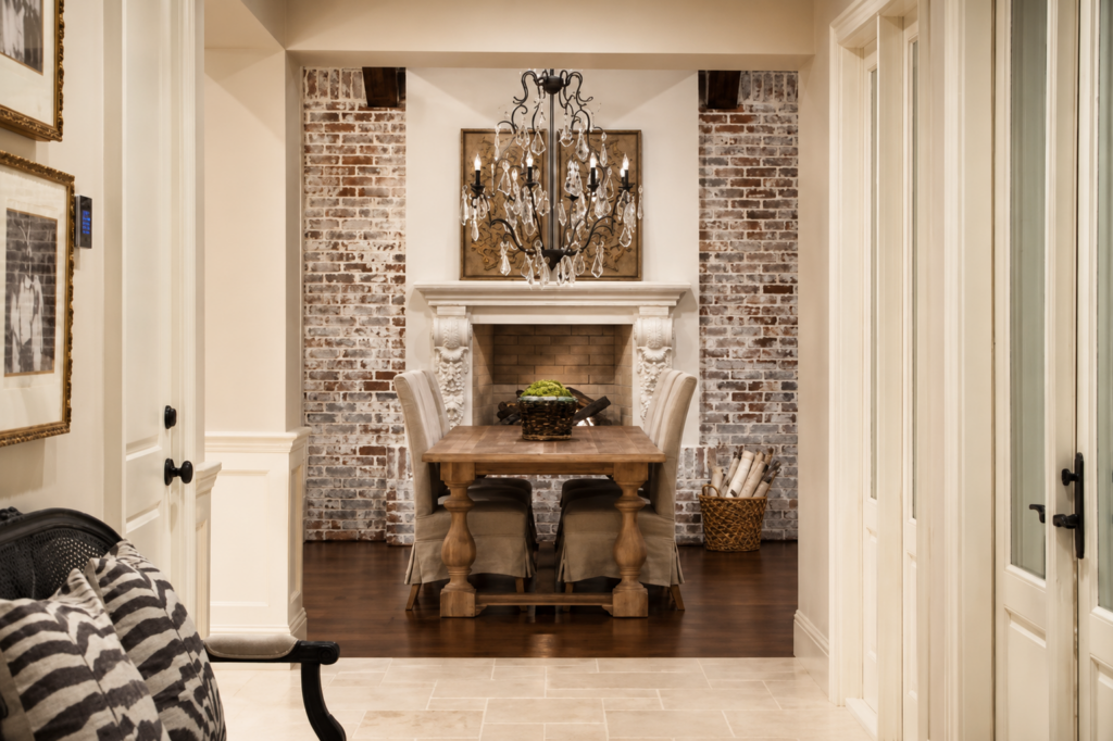 Fireplace detail in a French Chateau custom home by Posada Custom Homes